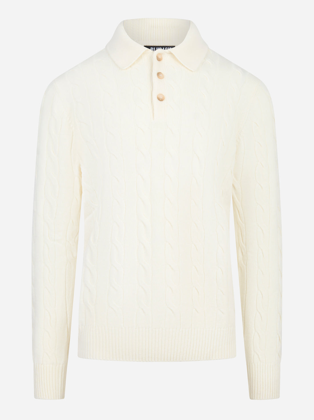 Polo bianca con motiva a treccia