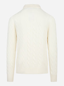 Polo bianca con motiva a treccia