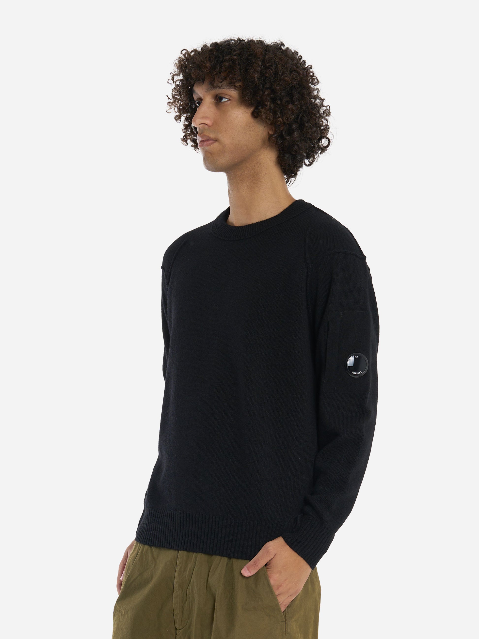 Maglia girocollo in lambswool con logo Nera