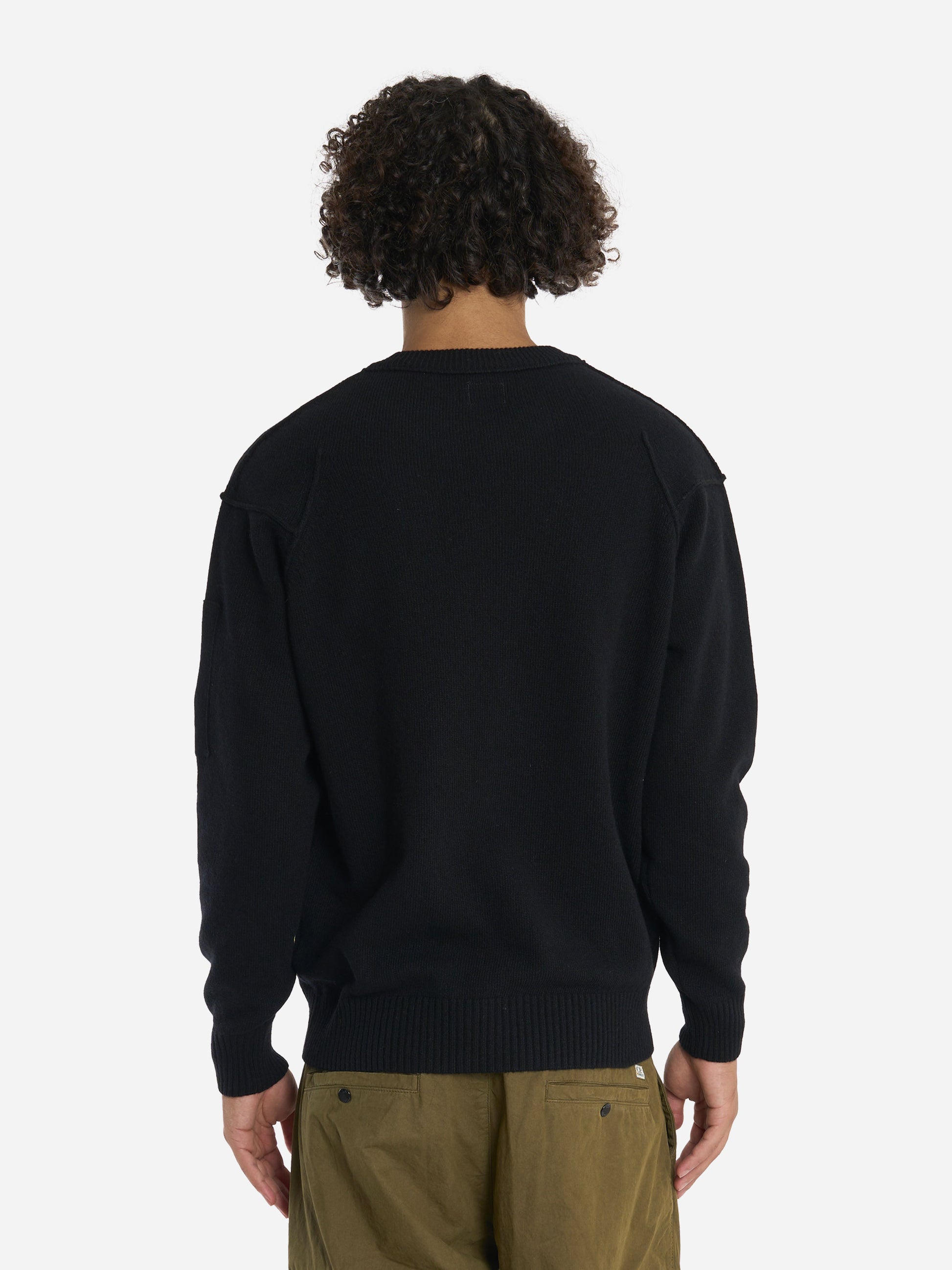 Maglia girocollo in lambswool con logo Nera