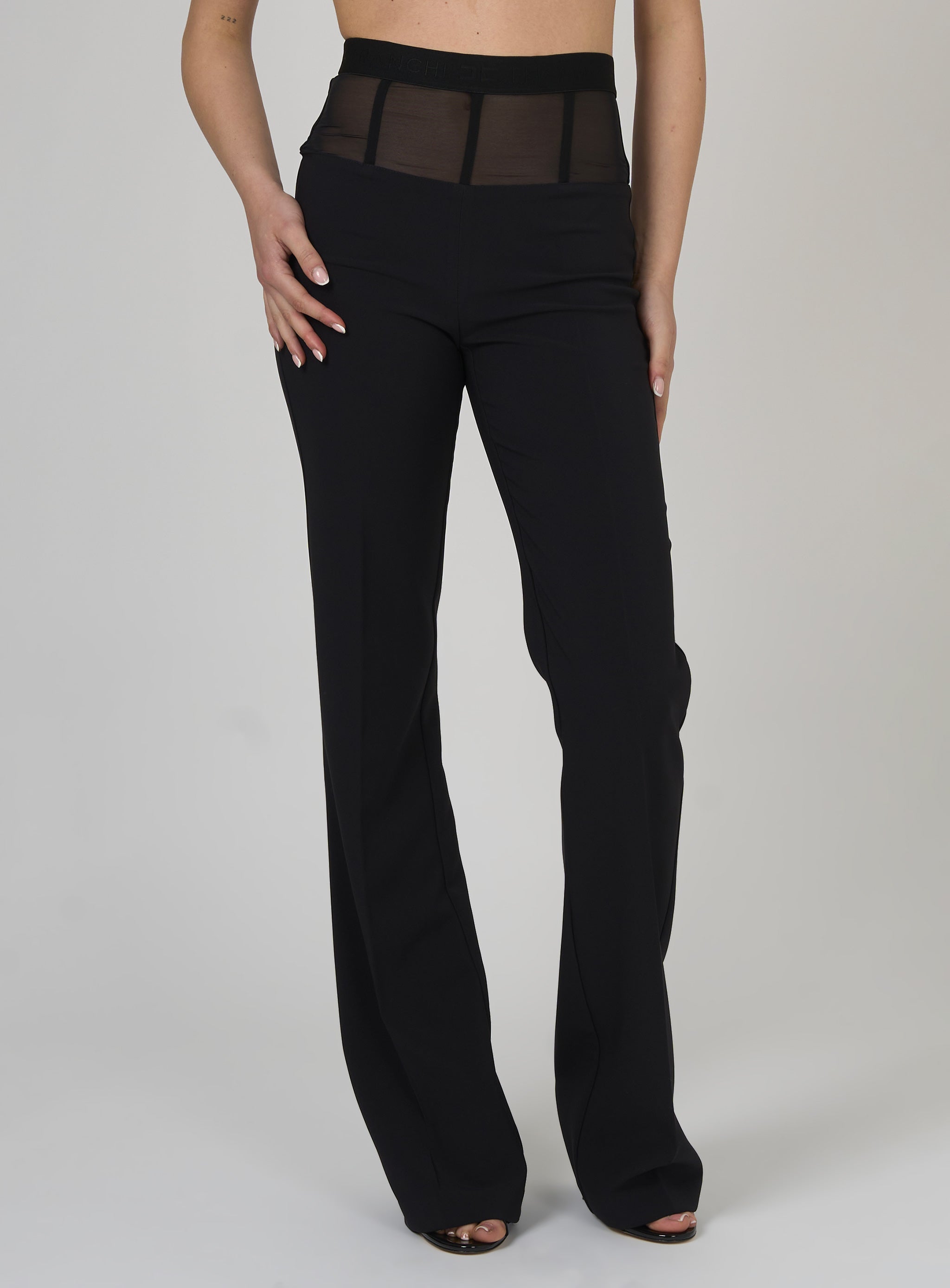 Pantaloni in crepe con baschina in tulle Nero