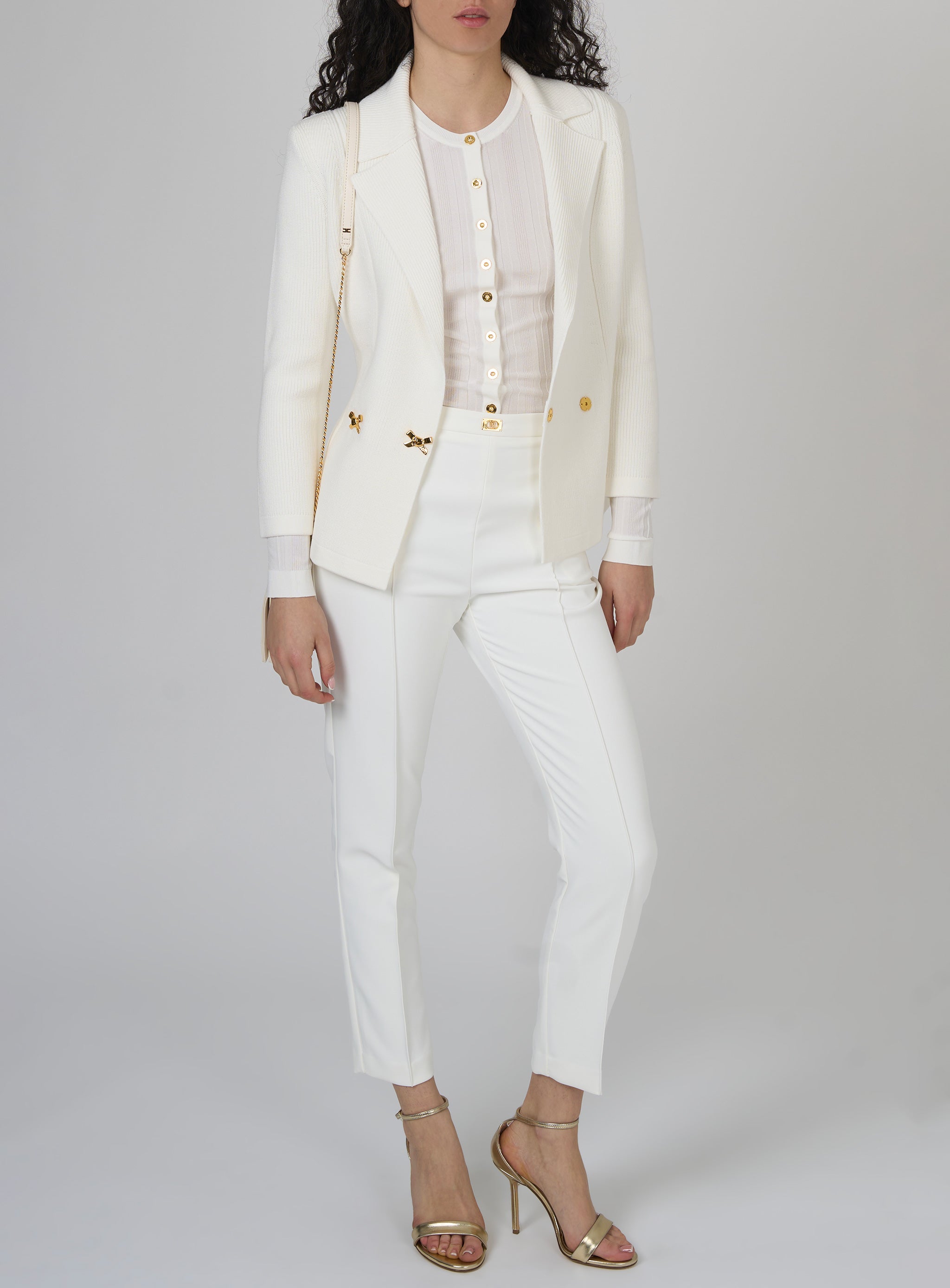 Pantaloni in crepe con tasche e placca logo Bianco
