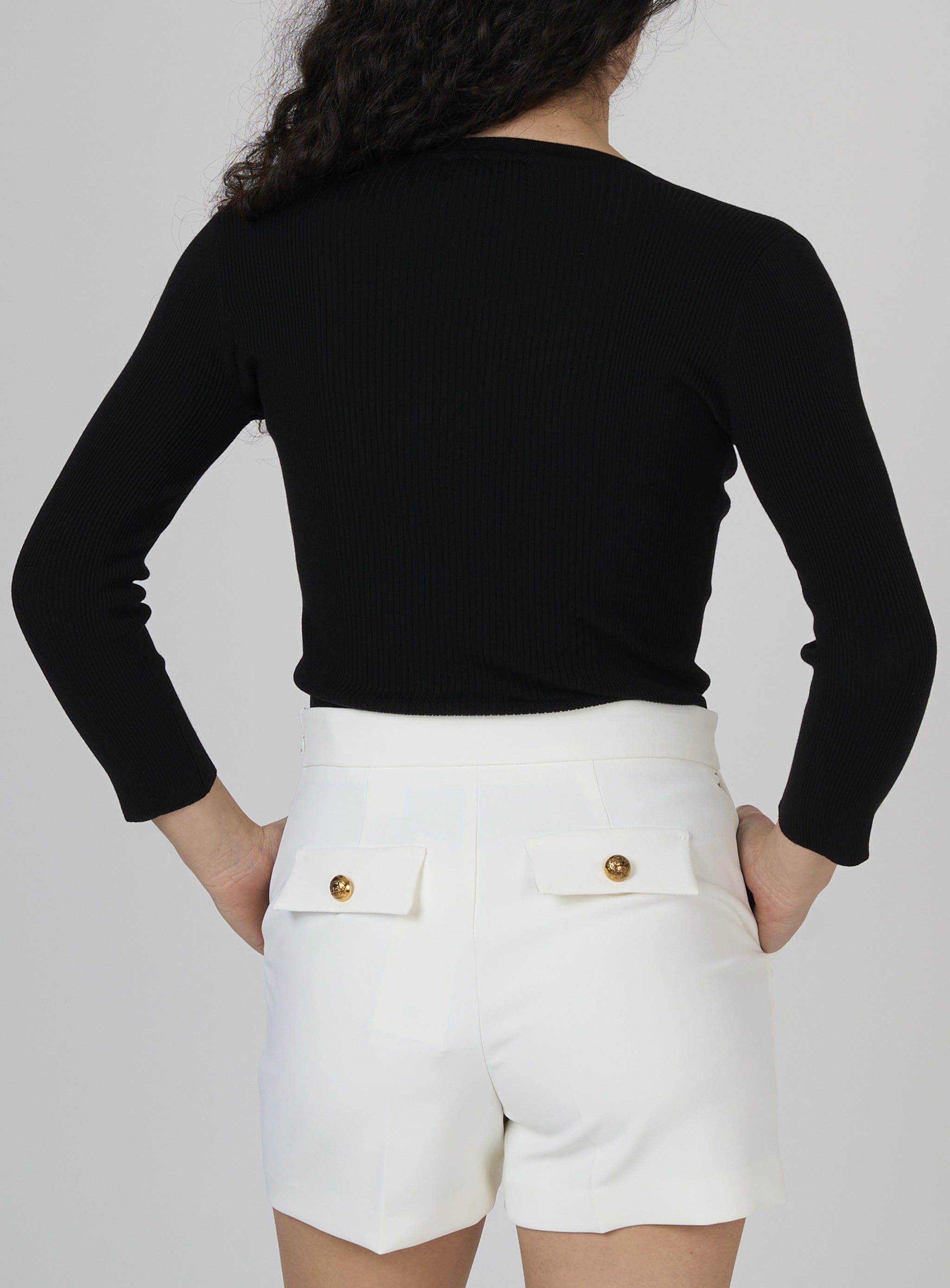 Maglia a micro costine con taschino Nero