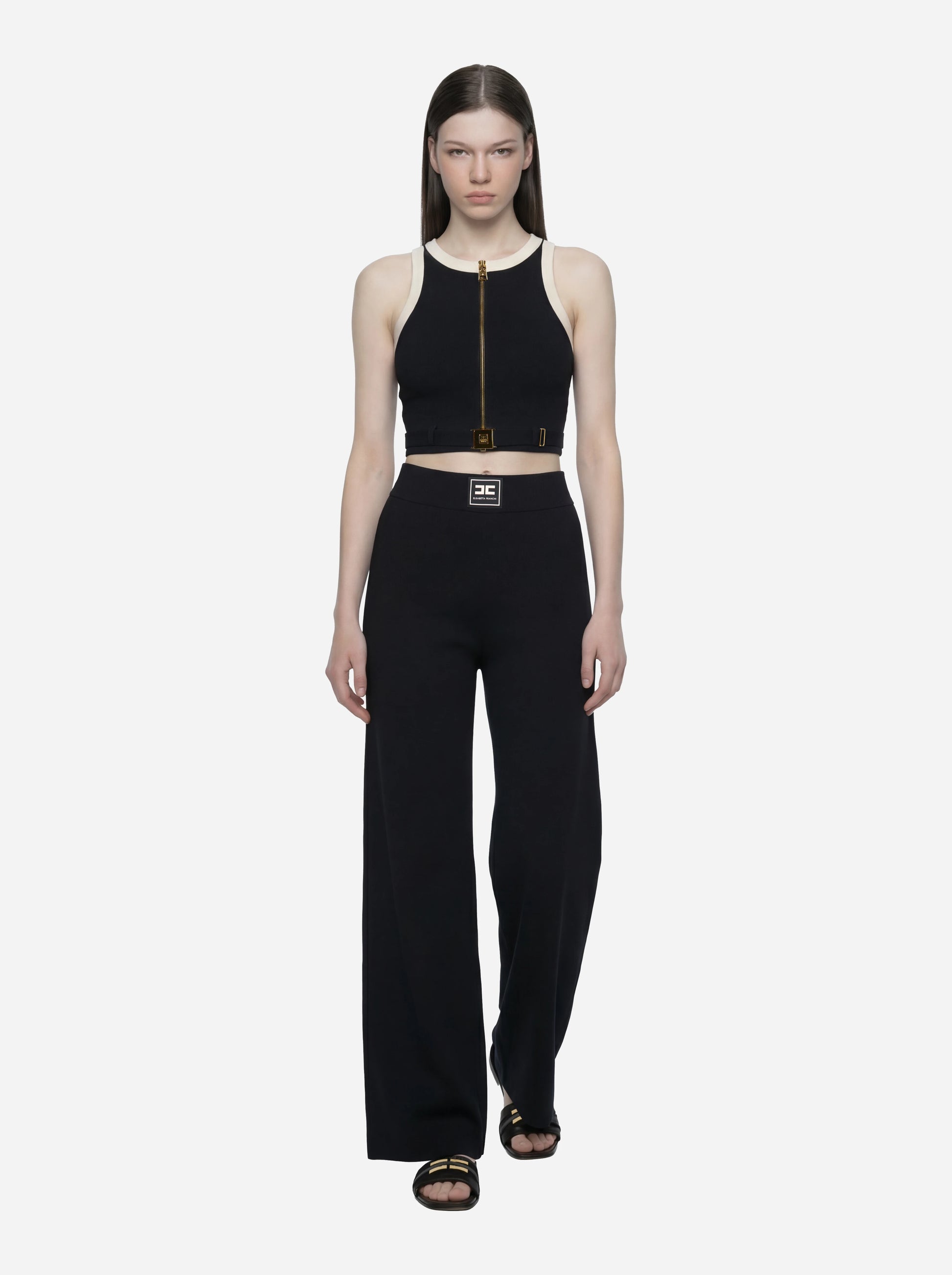 Pantalone in maglia nero con bande in viscosa lucida