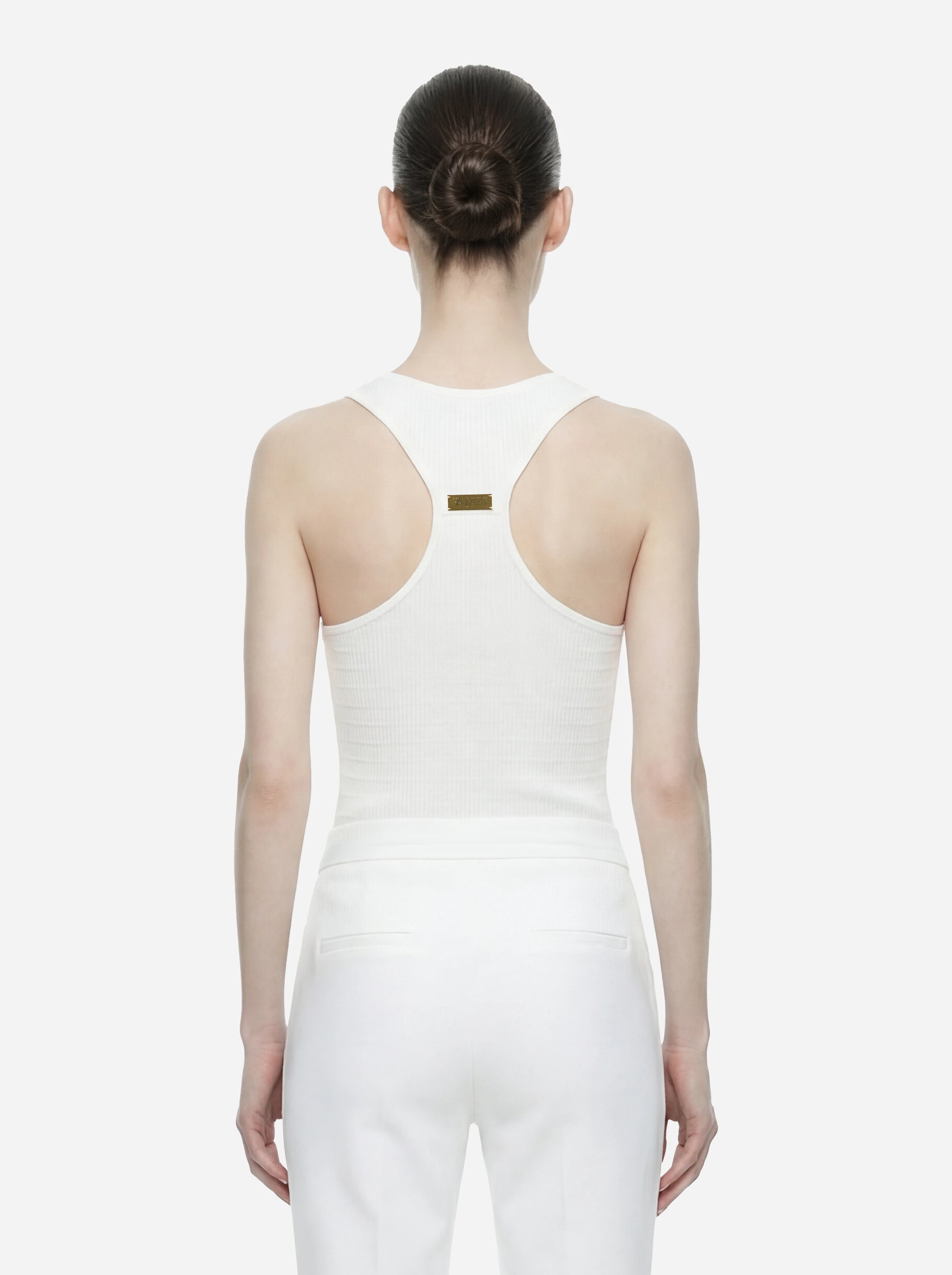 Top in maglia bianco a micro trecce