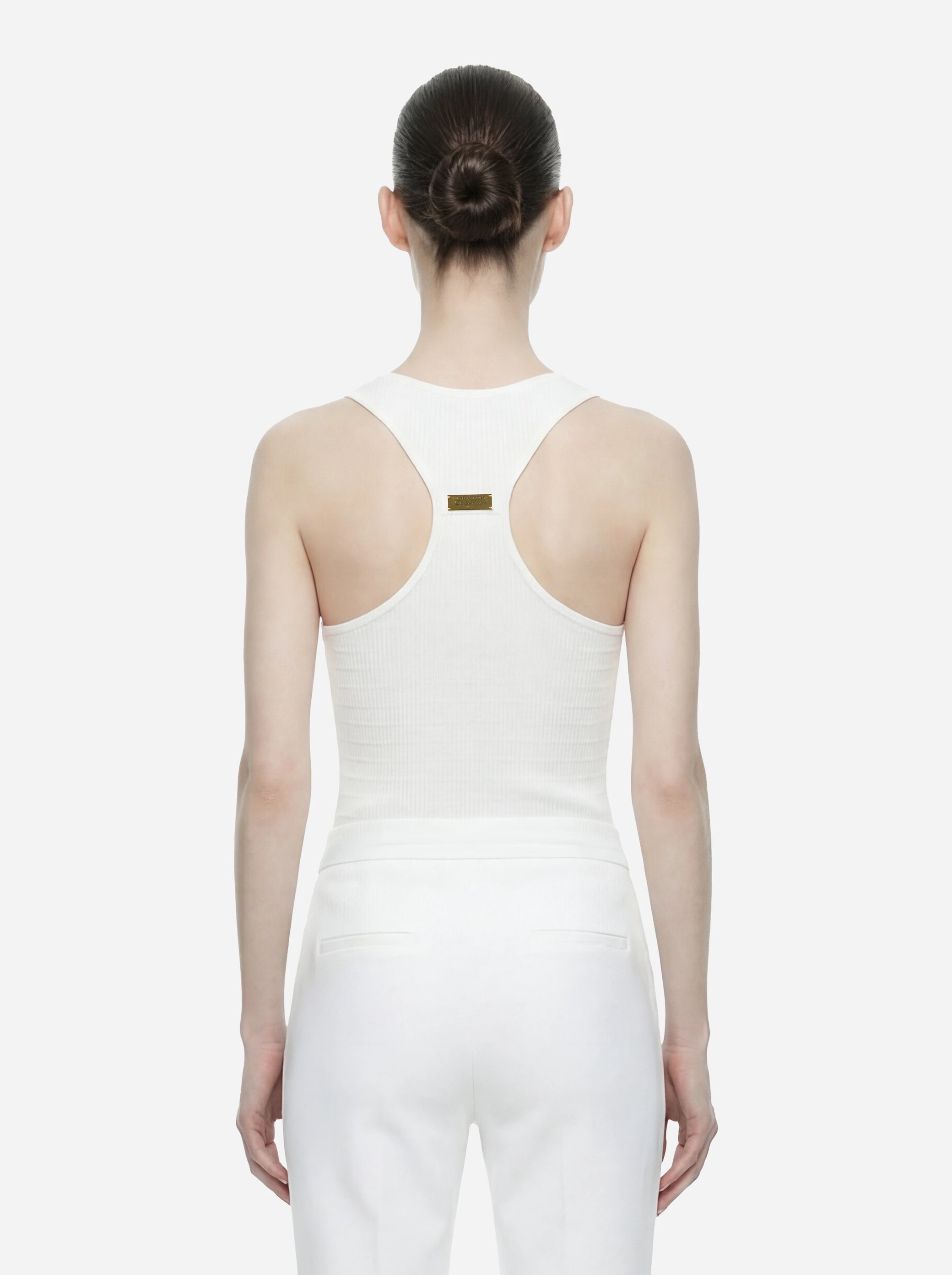 Top in maglia bianco a micro trecce