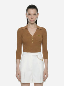 Polo beige in maglia a micro trecce