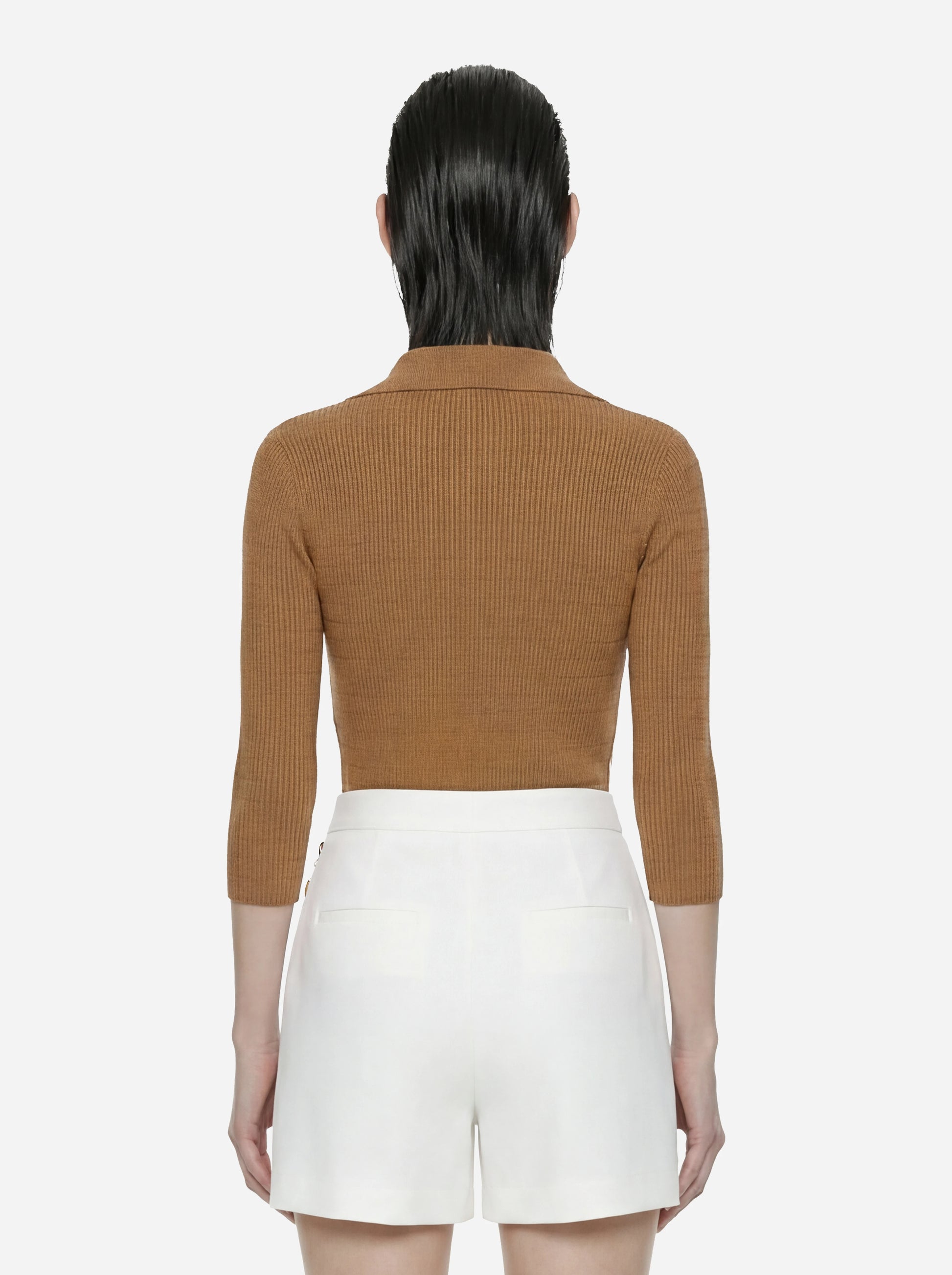 Polo beige in maglia a micro trecce