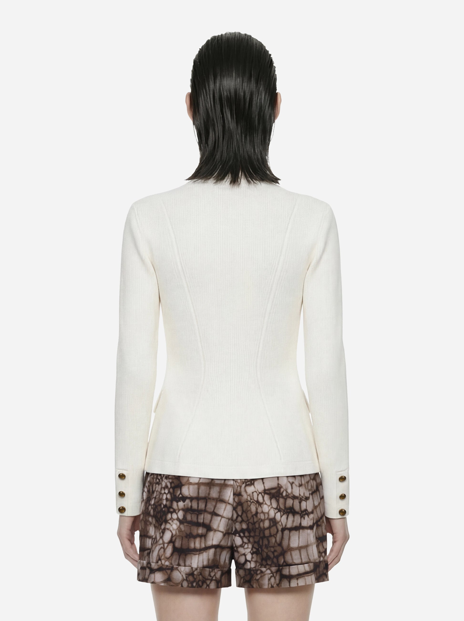 Giacca in maglia bianca con bottoni gioiello
