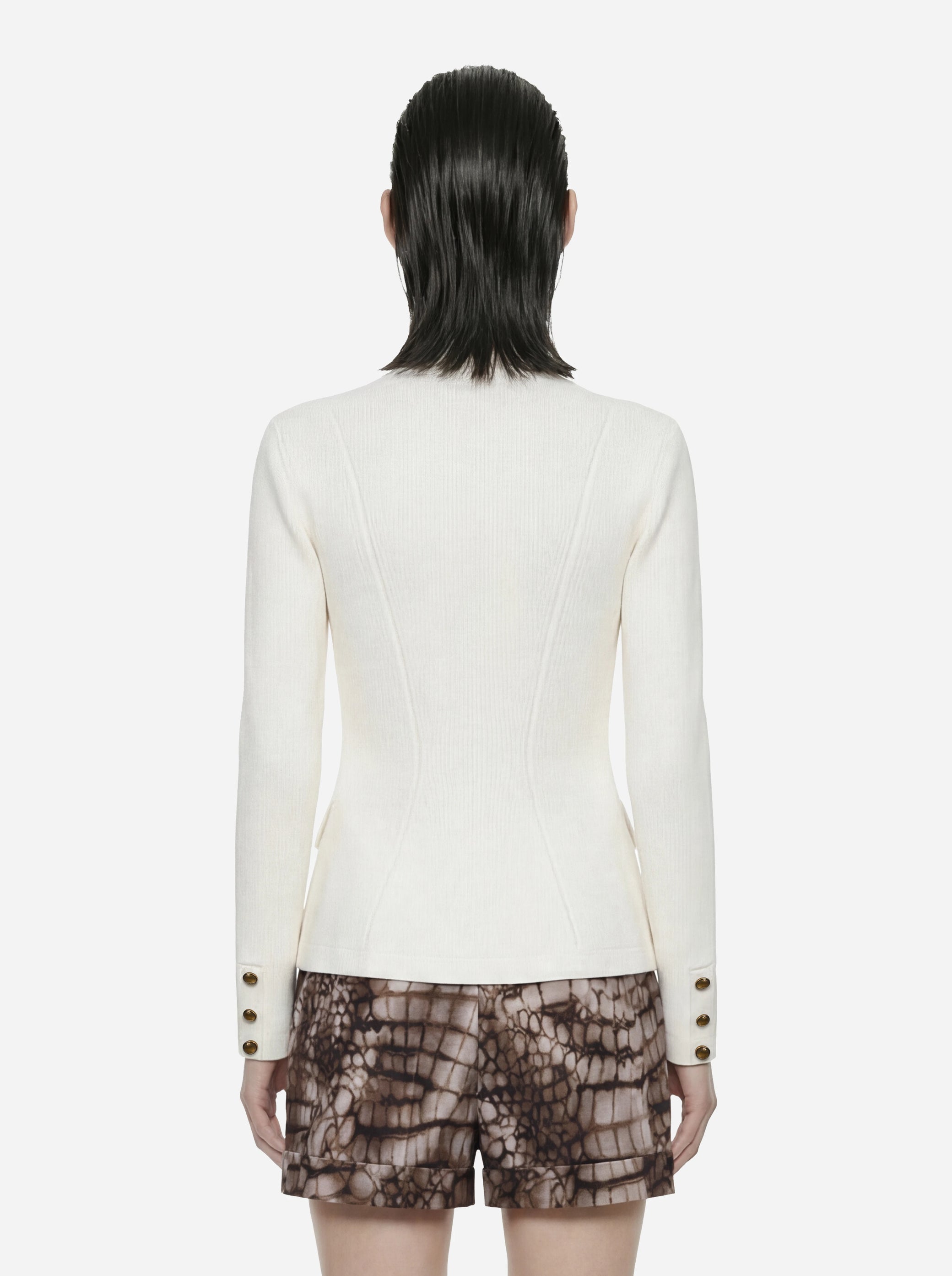 Giacca in maglia bianca con bottoni gioiello