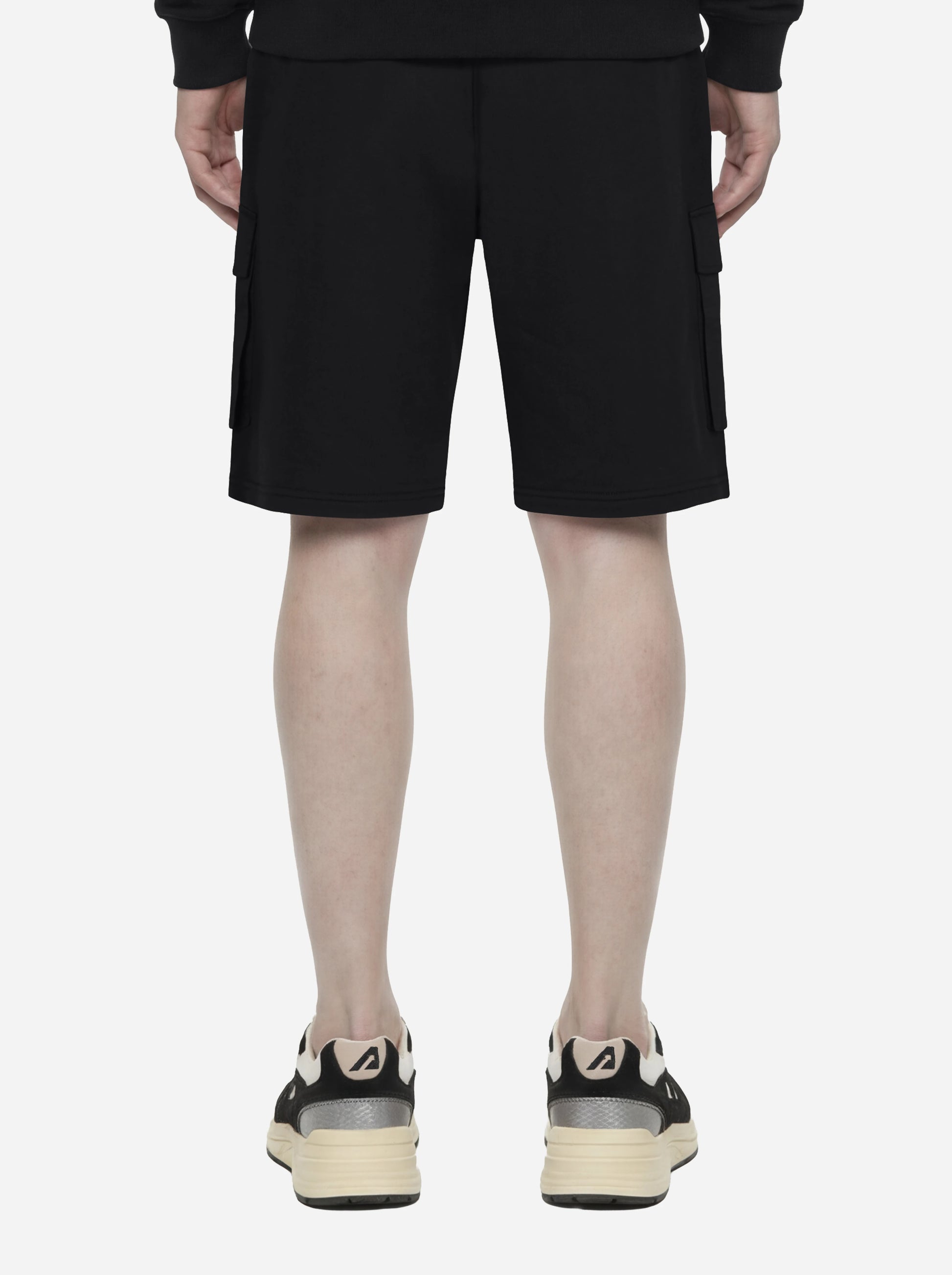 Shorts in jersey nero con tasche