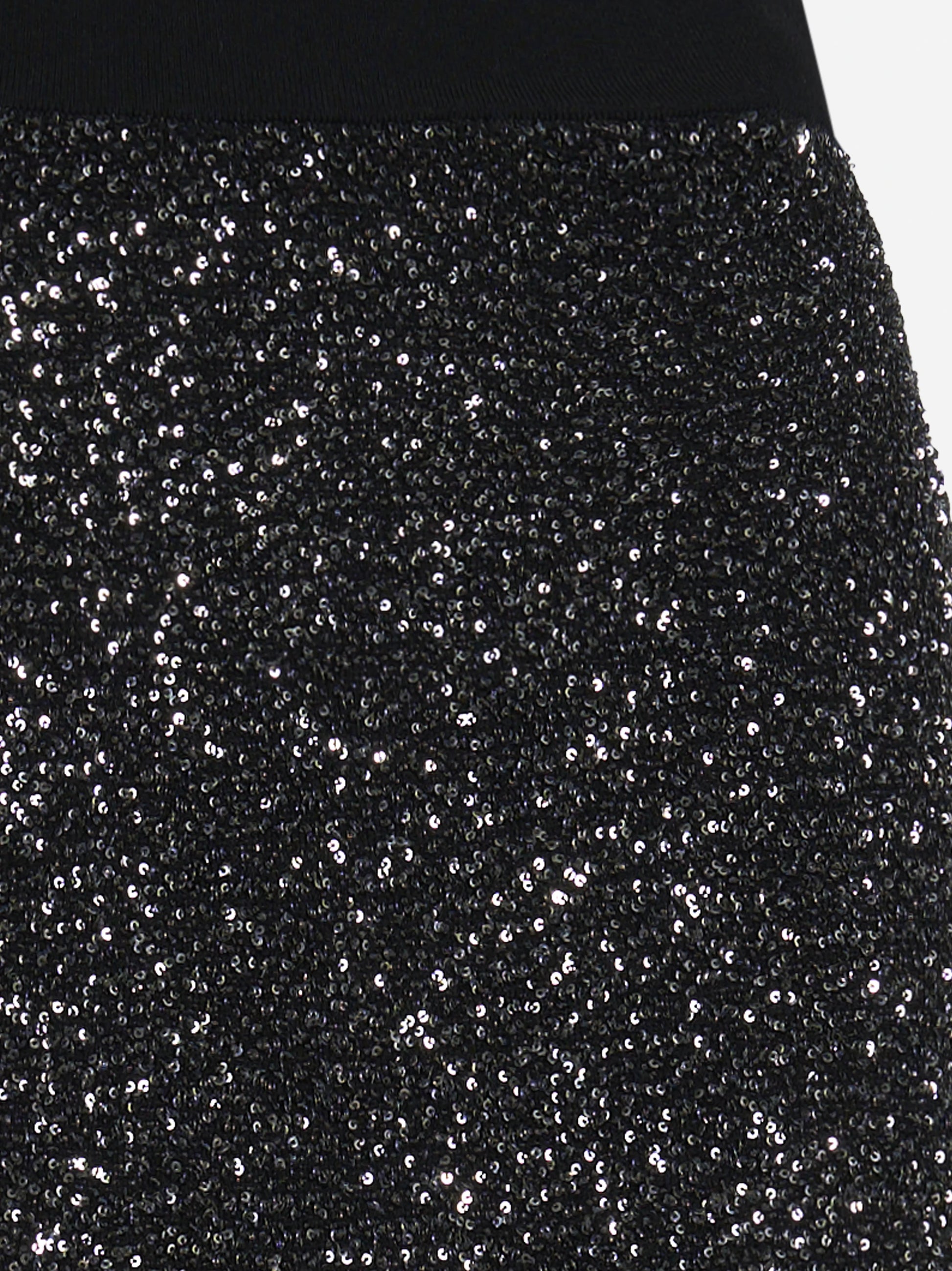 Gonna corta in maglia con paillettes nera - dettaglio prodotto