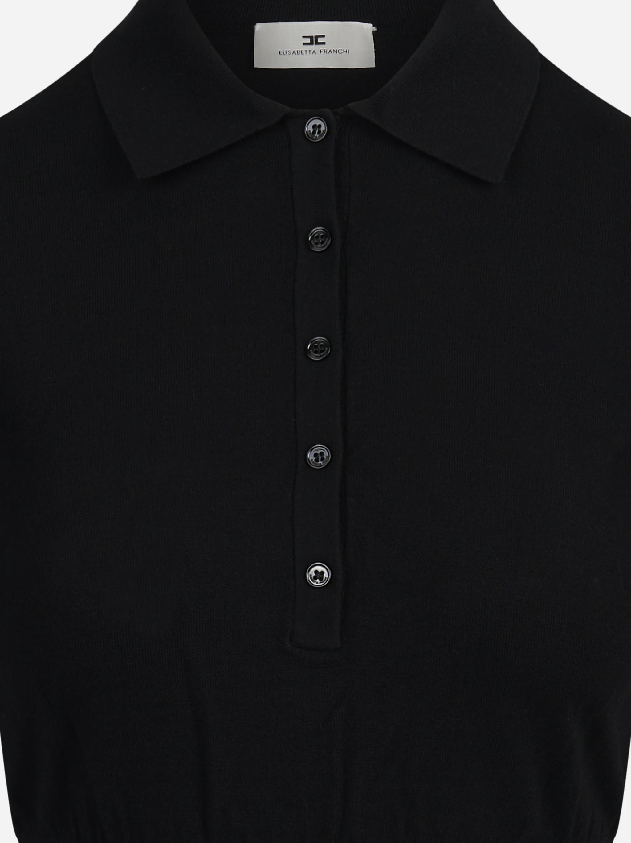 Polo aderente in maglia nera - dettaglio prodotto