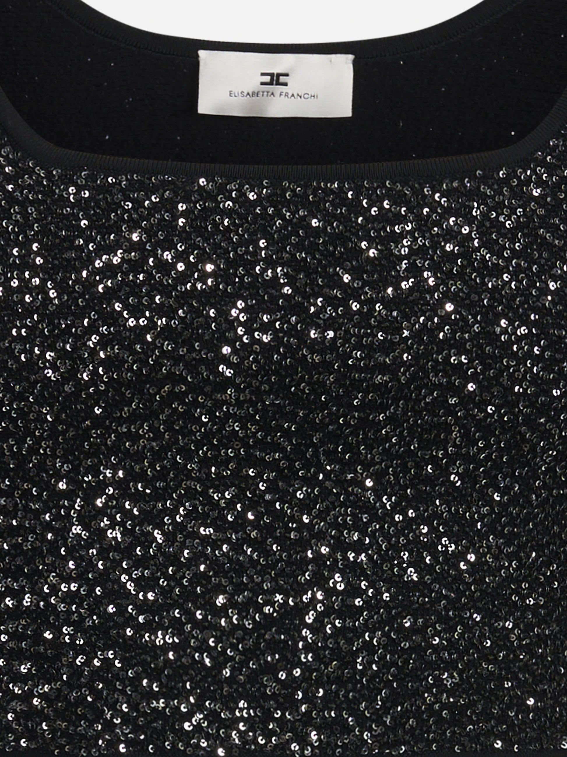 Top corto in maglia con paillettes nero - dettaglio prodotto