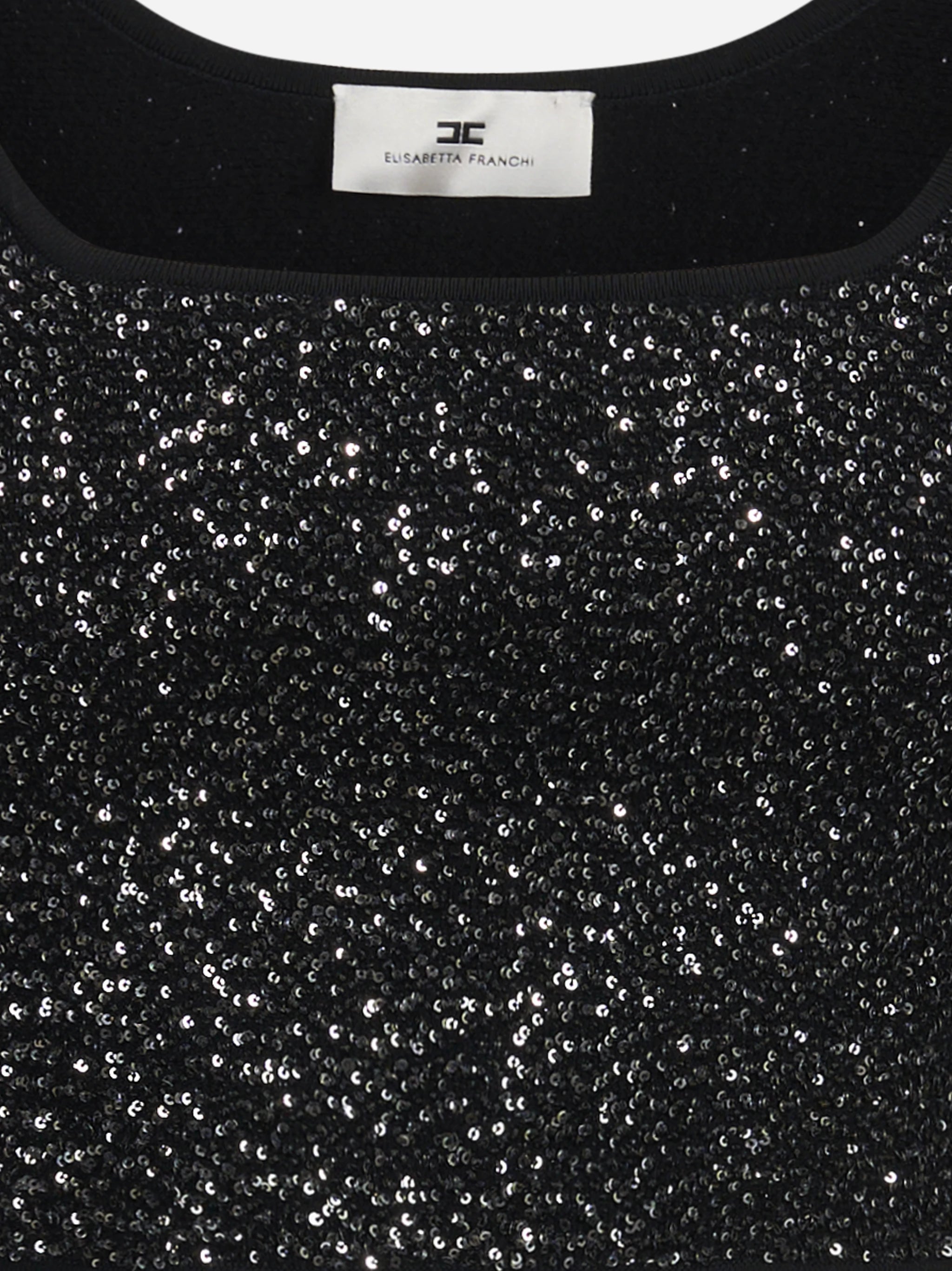 Top corto in maglia con paillettes nero - dettaglio prodotto