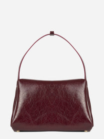 Borsa Calypso Trunk in pelle vegana bordeaux - vista laterale