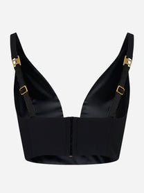 Retro del top Elisabetta Franchi con fibbie dorate e zip centrale